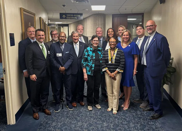 Group photo after meeting with Acting Secretary, Adrianne Todman, of the U.S Department of Housing and Urban Development